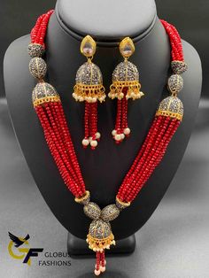 Red color beads with black stones pendant and matching jumka earrings Handmade jewelry Silver-plated jewelry One gram gold jewelry Official Website globusfashions.com 🌸 S H O P . M O R E . S T Y L E S 🌸 https://www.etsy.com/shop/Globusfashions Necklaces - https://www.etsy.com/shop/Globusfashions?section_id=18712263 Bracelets - https://www.etsy.com/shop/Globusfashions?section_id=18969767 Pendant Sets - https://www.etsy.com/shop/Globusfashions?section_id=18707402 Tikka - https://www.etsy.com/sho Festive Black Beaded Necklace For Celebration, Red Faceted Beads Jewelry For Party, Festive Temple Jewelry With Black Beads, Celebration Black Beads Temple Jewelry, Festive Jewelry With Dangling Beads For Celebration, Traditional Gold Earrings With Faceted Beads, Traditional Red Necklace With Black Beads, Traditional Red Necklaces With Black Beads, Traditional Ruby Jewelry Set For Party