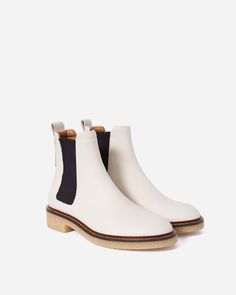 Casual, yet functional—in the best way possible. The Chelsea Boot features a rounded toe, a cushioned insole (for added comfort), elastic side panels, a mid-ankle height, a back pull tab, and a contrast rubber outsole for added durability (and style). The best part? It’s made of silver-rated nappa leather, which means it’s buttery-soft and comfortable. Leather Chelsea Boots, White Boots, Chelsea Boot, Side Panels, Pull Tab, Nappa Leather, Panel Siding, Italian Leather, Chelsea Boots