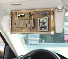 the interior of a car with an assortment of items on it