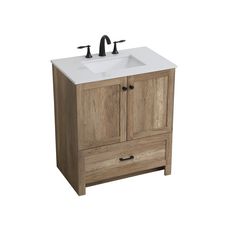 a bathroom vanity with two faucets on the top and one sink below it