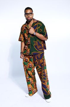 PRODUCT DETAILS: Designed in the U.S., hand-crafted in Africa Delivery within 2 weeks Multiple prints available This exceptional, Igbo Traditional multi-colored shirt and pants set, made of unique cotton African Isi Agu print fabrics, will make you stand out with the pops of color and provide a nice, laid back sense of style! This unisex shirt & pant can be worn as evening wear to various events such as weddings, dinner parties and other formal occasions. FABRIC CARE: Dry Clean. Hand Wash. Machine Wash. SIZE CHART: Multicolor Printed Cotton Pants, Casual Patterned Cotton Sets, Casual Cotton Matching Pant Set, Multicolor Printed Cotton Pant Set, Cotton Sets With Relaxed Fit Long Pants, Casual Printed Cotton Sets, Green Printed Cotton Pants, Relaxed Fit Cotton Set With Long Pants, Relaxed Fit Cotton Sets With Long Pants