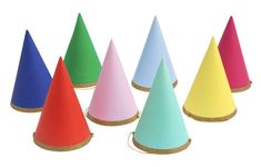 several different colored cones sitting in a row