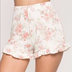 Amazingly Cute For Spring Or Summer. These White Floral Shorts Are Ribbed Featuring An All Over Ruffle Trim And Elasticize Waist. Partially Lined With Finished Seams. 100% Cotton. Cold Wash, Tumble Dry. Model Is 5’8” In Size Small. Bin New#1t Posh Ambassador | Top Rated Seller | Next Day Shipping | Offers Welcome | Bundle & Save White Floral Print Loungewear Bottoms, Feminine White Pajama Shorts For Loungewear, White Short Bottoms For Pajama Party, White Short-length Bottoms For Pajama Party, White Short Length Bottoms For Pajama Party, White Shorts With Elastic Waistband For Sleepover, Feminine Cotton Bottoms For Pajama Party, Feminine Spring Bottoms For Pajama Party, Feminine White Pajama Shorts For Pajama Party