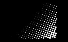 an abstract black and white background with circles in the center, as well as dots on the side