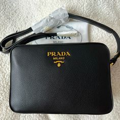 Brand New. Comes With Dust Bag & Authenticity Cards. Black Leather With Gold Hardware. 100% Authentic. 5 Seller. Fast Shipping Happy Poshing. Chic Black Bags With Logo Plaque, Black Evening Shoulder Bag With Logo Plaque, Black Shoulder Bag With Logo Plaque For Evening, Modern Black Bags With Logo Plaque, Black Shoulder Bag With Logo Plaque For Business, Black Business Shoulder Bag With Logo Plaque, Formal Black Shoulder Bag With Logo Plaque, Black Travel Bags With Logo Plaque, Black Evening Bag With Logo Plaque