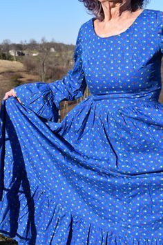 beautiful handmade dress Vintage Blue Dress With Ruffle Hem, Blue Fitted Bohemian Vintage Dress, Fitted Blue Bohemian Vintage Dress, Blue Cottagecore Vintage Dress For Spring, Blue Fitted Prairie Dress For Spring, Fitted Blue Prairie Dress For Spring, Blue Long Sleeve Cottagecore Dress, Blue Peasant Dress With Ruffles, Blue Long Sleeve Peasant Dress