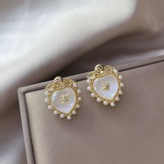 Material: Alloy Style: Simple Trendy Alloy Earrings For Wedding, Trendy Alloy Wedding Earrings, Trendy Silver Pearl Earrings For Wedding, Elegant White Pierced Heart Earrings, White Alloy Pearl Earrings As A Gift, Elegant Silver Metal Heart Earrings, White Alloy Dangle Earrings, White Alloy Earrings For Wedding, White Dangle Alloy Earrings