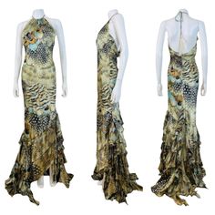 S/S 2004 Roberto Cavalli Silk Dress Gown Incredible multi feather print silk fabric with gold glitter acents Halter neckline with with long ties with an iridescent beads and feathers at each end Keyhole cut at at the bodice Form fitted style with wide flared ruffled mermaid hem with cut out details Train in the back Open upper back Hidden zipper up the back Unlined Marked S, Measurements - Bust 19", Waist 14", Hips 19", Length 70" in front 75" in back (taken from top of dress at neckline, dress Roberto Cavalli Vintage, Galliano Dress, Cavalli Dress, Printed Silk Fabric, Silk Dressing Gown, Printed Halter Dress, Maxi Gown Dress, Neckline Dress, Fitted Style