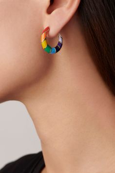 Somewhere over the rainbow. These hoops are the perfect transition piece to take you from day to night. Features a multicolor rainbow enamel surrounding a stripe pattern. Lip Stud, Alison Lou, Somewhere Over The Rainbow, Rainbow Jewelry, Rainbow Earrings, Day To Night, Star Studs, Heart Studs, To Night