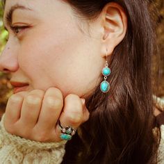 Beautiful Turquoise earrings for boho women. These Turquoise earrings feature two stones set in sterling silver which is perfect for anyone with sensitive skin! Turquoise is a symbol of good luck, prosperity and abundance. It also protects against negative energy and helps to provide the energetic strength to lean into good fortune and positivity. Material: Genuine Sterling Silver 92.5 Gemstone: Turquoise Length/wide: 45mm Stone size: 10mm Condition: Brand new Everyday Turquoise Gemstone Earrings, Everyday Turquoise Jewelry With Natural Stones, Everyday Sterling Silver Turquoise Ring, Turquoise Jewelry With Matching Earrings, Turquoise Spiritual Jewelry With Matching Earrings, Bohemian Teardrop Turquoise Ring, Spiritual Turquoise Jewelry For Everyday, Hypoallergenic Turquoise Jewelry, Everyday Spiritual Turquoise Jewelry