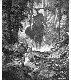 a man riding on the back of a horse through a forest