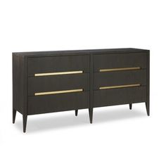 the sideboard has two drawers and gold handles on each drawer, along with a white background