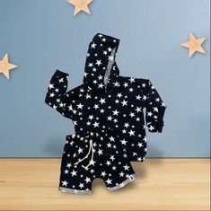 This kid's hoodie is black with a design of white stars, made from soft and comfortable French Terry fabric, perfect for keeping cozy and stylish on any occasion.  We recommend washing on cold and low to dry to extend the life. Iron as needed and do not use chlorine bleach.  Check out the rest of our items here! https://www.Etsy.com/shop/paradisekidsboutique  Shop our handmade boutique collection of joggers, leggings, shorts and more cute fashion for kids. Paradisekidsboutique wardrobe is made w Cotton Long Sleeve Hoodie With Star Print, Cotton Hoodie With Star Print, White Long Sleeve Hoodie With Star Print, White Star Print Hoodie For Winter, White Star Print Winter Hoodie, Black Hoodie Sweatshirt With Star Print, Toddler Boy Hoodie, Star Hoodie, Black And White Stars