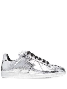 metallic low-top sneakers from Maison Margiela featuring silver, grey/white, calf leather, metallic finish, round toe, front lace-up fastening and flat rubber sole. Silver Leather Low-top Custom Sneakers, Metallic Low-top Sneakers With Vulcanized Sole, Silver Metallic Leather Low-top Sneakers, Silver Low-top Sneakers With Textured Sole, Tabi Sneakers Margiela, Maison Margiela Replica, Margiela Sneakers, Margiela Replica, Sneakers Grey