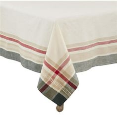 a table with a white and red checkered cloth on it