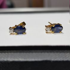 14k solid yellow gold natural ceylon blue sapphire gemstone and natural round brilliant cut shaped diamonds gemstones earrings. 1. The weight of the natural ceylon blue sapphire gemstone used in the earrings =0.90 cts. 2. The weight of the natural diamonds used in the earrings =0.10 cts. 3. The weight of 14k solid yellow gold used in the earrings =1.620 grms. The sapphire is the birthstone for the people born in the month of September. The earring is very nice and beautiful. I have used all my s Oval Sapphire Earrings With Diamond Accents, Classic Oval Sapphire Diamond Earrings, Blue Sapphire Oval Diamond Earrings, Sapphire Oval Diamond Earrings, Sapphire Color Oval Diamond Earrings, Yellow Gold Sapphire Earrings, Yellow Gold Oval Diamond Earrings With Gemstone, Oval Sapphire Diamond Earrings For Anniversary, Oval Sapphire Earrings Hallmarked