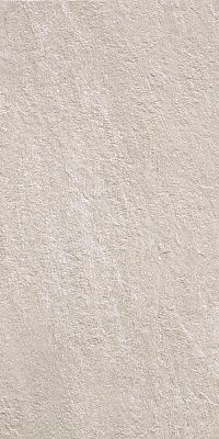 a white stucco wall textured with light gray paint