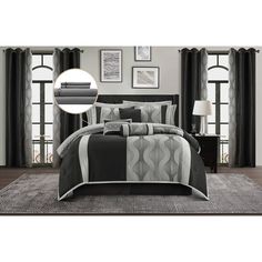 a black and grey bed in a bedroom