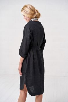 "Stylish linen belted dress with irregular midi length, rolled up sleeves and two side pockets. Classical black color is never boring, always appreciated and suits everybody! Feminine, rounded style of this dress has romantic vibe, yet it is sophisticated and even modest, suitable for everyday or some formal events. Stonewashed linen fabric gives this garment unique appearance and feel of softness, which I am sure you will highly appreciate! FABRIC: 100% Highest quality, stonewashed linen MODEL: Black Long Sleeve Belted Dress For Spring, Black Belted Dress For Office In Spring, Black Belted Dress For Office And Spring, Fall Black Dress With Belted Cuffs, Black Dress With Belted Cuffs For Fall, Black Dresses With Belted Cuffs For Fall, Knee-length Work Dresses With Roll-up Sleeves, Knee-length Dresses With Roll-up Sleeves For Work, Black Belted Knee-length Dress For Work