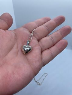 "Sterling Silver, hammered style, smooth puffy heart shape pendant. Approximate heart size: 15mm Diameter x 9mm Thickness. Chain: 1mm box chain (16\"/18\"/20\") 🌟 All our Silver Jewelry are handmade or handcrafted and guaranteed 925 silver.  ⭐️Free silver polishing cloth  ⭐️ It's completely natural for sterling silver to oxidize over time when it's exposed to air. Please, keep them in airtight plastic bag and use sterling silver polishing cloth to make them shine like new again. ⭐️ Each piece is packed in its own drawstring pouch and ordered is mailed out in bubble mailers to avoid any damages that can happen during transportation." Hammered Silver Heart Jewelry, Hammered Heart-shaped Jewelry Gift, Heart-shaped Hammered Sterling Silver Jewelry, Heart-shaped Sterling Silver Necklace For Gift, Silver Heart Pendant Jewelry With Heart Print, Sterling Silver Tarnish-resistant Heart Pendant Necklace, Sterling Silver Heart Pendant Charm Necklace, Tarnish Resistant, Valentine's Day Silver Heart-cut Necklace, Puffy Heart