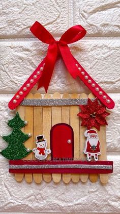 a christmas decoration made out of popsicle sticks