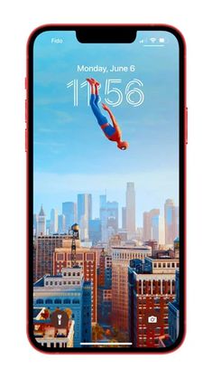 an iphone with the image of spider man flying through the air in front of a city skyline