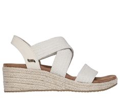 Celebrated lifestyle expert, Martha Stewart, delivers her one-of-a-kind touch to Skechers in this classically chic collaboration. Elevate your style and summery comfort in Martha Stewart x Skechers Cali Arch Fit Beverlee - Brentwood. This vegan wedge sandal features a textured knit gore upper with an Arch Fit footbed and Luxe Foam cushioning. | Skechers Women's Martha Stewart: Arch Fit Beverlee - Brentwood Sandals | Medium Width | From the Skechers x Martha Stewart collaboration | Patented Skech Chic Beach Sandals With Arch Support, Chic Sandals With Arch Support For Summer, Chic Summer Sandals With Arch Support, Summer Clearance Sale, Summer Clearance, Wide Shoes, Skechers Women, Skechers Shoes, Textured Knit