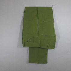 "Vintage 1960-70's JCPenney's RANCHCRAFT Penn-Prest Pants, 50 Cotton 50 Poly, Tapered Leg, These pants are Olive Green or Army green. (on my computer the pictures show a much brighter green), Plain Pockets, Very Good Condition. Measurements: 34\" waist 30.5\" inseam 11\" rise 39.5\" outseam 16.5\" leg opening" 90s Style Green Pants With Pockets, Retro Green Pants With Pockets, Green Hippie Wide-leg Pants, Vintage Green Straight Leg Pants, Vintage Green Wide-leg Bottoms, Brown Slacks, 70s Pants, Army Pants, Blanket Sweater