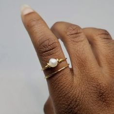 Freshwater Pearl Gold Wire Ring | Etsy Minimalist Adjustable Pearl Ring With Charm, Adjustable Delicate Yellow Gold Pearl Ring, Gold Adjustable Pearl Drop Ring, Adjustable Gold Pearl Drop Ring, Adjustable Gold Stackable Pearl Ring, Adjustable Stackable Gold Pearl Ring, Dainty Adjustable Gold Pearl Ring, Gold Wire Ring, Bead Bar