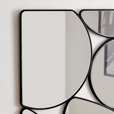 a mirror that is hanging on the wall