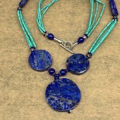 "32.6 grams, 2mm - 30mm, 21\" Multi-strands Beaded Lapis Lazuli Pendant Necklace ATS Statement, oval, round shape, Green Synthetic Turquoise. Ep157 Weight: About 32.6 Grams or so Lapis Beads: About 17mm-30mm Lapis Beads Thickness: About 4-5mm Nephrite Beads Size: 1mm x 2-3mm Length: About 21\" or so The exact item will be delivered. I list one by one. So, purchase with confidence. I do offer combined shipping." Adjustable Double Strand Blue Turquoise Necklace, Adjustable Double Strand Turquoise Blue Necklace, Turquoise Necklace With Oval Gemstone Beads, Blue Double Strand Natural Stones Jewelry, Blue Turquoise Necklace With Oval Gemstone Beads, Blue Turquoise Necklace With Round Beads, Blue Natural Stone Oval Beads, Blue Oval Natural Stone Beads, Blue Natural Stone Beaded Necklaces With Oval Beads