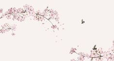 pink flowers and a bird flying in the sky