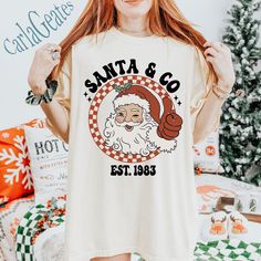 Santa & Co Est 1983 Christmas Shirt, Vintage Santa Claus Sweatshirt, Santa Shirt, Merry Christmas 2024, Xmas Gift, Comfort Color Shirt ---------- How to Order Your Shirt ---------- * Choose your shirt color * Choose your size * Choose your shirt style * PLEASE make sure all your order's steps ---------- Production and Shipping ---------- *Production: 1-3 days *Standard Shipping:  - USA: 3-5 business days after production time - Canada: 5-7 business days after production time - Worldwide: 15-20 b Santa Shirt, Santa Shirts, Vintage Santa Claus, Vintage Santa, Color Shirt, Comfort Color, Christmas 2024, Vintage Santas, Christmas Shirt