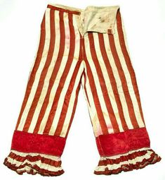 a pair of red and white striped pants with ruffles