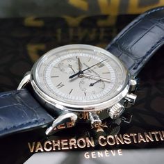 Striking Vacheron Constantin Historiques Cornes De Vache 1955. This timepiece honors the iconic and bold "cow horns" featured on the original 1955 manual-winding chrono reference 6087. This timepiece is pure elegance that's impossible to resist.The silver opaline dial is adorned with a painted tachymeter scale, 2 chrono subdials and applied gold roman numeral markers. The blue chrono hands provide just enough color and white minute track on the dial ties all together for a stunning look. Inner W Timeless Collectible Watches With Tachymeter, Classic Chronograph Watch In White Gold, Timeless Formal Chronograph Watch With Polished Finish, Timeless Chronograph Watch With Polished Finish For Formal Occasions, Classic White Gold Chronograph Watch With Polished Finish, Classic Collectible Chronograph Watch, Classic Chronograph Watch As Collectible, Luxury Chronometer Watch For Collectors, Cow Horns