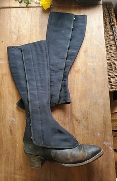 A pair of vintage Swedish Percival long black popper button-up spats with elastic for fixing under the shoe.  They are cotton canvas type material and easy to clean with a wooden interior. The buttons are half concealed and are the popper button fixings. There is one tiny area on the front of one that has some loose stitching. This can be repaired by a steady hand. The come from a French Manor House in the South West of France and were stored with many other linen and haberdashery items for deca Spats Shoes, French Manor House, French Manor, Wooden Interior, Shoe Covers, South West, Manor House, Long Black, Adult Costumes