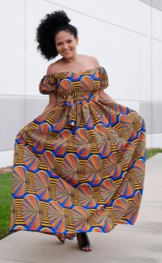 "African Ankara women short sleeve with bold print Maxi Dress handmade off shoulder dress with sides pockets and belt Made with cotton fabric Multi color vibrant print print Contact me for other sizes or if you want different body measurements. Headwrap is available for additional cost Check the measurement before purchasing. Please take your measurements before you order. Please don't assume that you know your measurements because every store has their own size guide. Let me know within 3 days Fitted Ankara Fabric Maxi Dress With Short Sleeves, Summer Ankara Fabric Maxi Dress, Spring Ankara Maxi Dress, Summer Maxi Dress In Ankara Fabric With Short Sleeves, Spring Maxi Dress In Ankara Fabric, Fitted Ankara Maxi Dress For Spring, Fitted Multicolor Off-shoulder Maxi Dress, Fitted Off-shoulder Multicolor Maxi Dress, African Head Dress