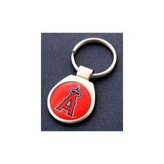 a red and silver keychain with the los angeles angels on it's side