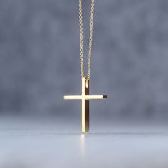 Minimal solid gold handmade cross necklace, unisex cross, great for men and women alike. Available in 14k yellow and 14k white gold, please make your choice from the drop down menu. This pendant has a shiny/polished finish. Size: 1,9 cm / 0.8 inches long and 1.5cm / 0,6 inches wide Material: 14k solid yellow gold, 14k solid white gold You can choose the charm with a 14k solid gold chain or without a chain. Perfect Birthday gift, Baptism gift or for any other special occasion. Comes in gift box. Minimalist 14k Gold Cross Pendant Necklace, Minimalist Cross Pendant Jewelry Gift, Gold Minimalist Tarnish Resistant Cross Necklace, Minimalist Yellow Gold Cross Pendant Necklace, Minimalist Cross Pendant Necklace As Gift, Minimalist Cross Necklace Tarnish Resistant, Simple Yellow Gold Cross Necklace, Minimalist Yellow Gold Cross Necklace, Minimalist Crucifix Necklace As A Gift