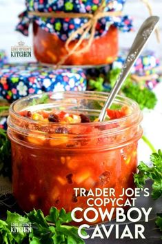 trader joe's copycatte cowboy caviar in a jar with a spoon