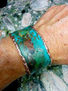 "* Copper Cuff Bracelet. Brass is available on the option. * 1.25\" Wide. 0.8 mm Thick Copper. Hammered and Molten Shiny Edges. Other Wide is available. Please contact. * Mixed Verdi Green Blue Patina with Rust. Matt Ceramic Coated on the Patina. Very durable and Hardly worn out. Shiny Patina will be done by the Request. Patina on both sides. * Advise your Wrist Size on the Note." Rustic Handmade Cuff Bangle Bracelet, Green Patina Bangle Bracelet, Green Bangle Bracelets With Patina, Green Patina Cuff Bracelet Gift, Green Patina Cuff Bracelet As Gift, Rustic Cuff Jewelry Gift, Rustic Cuff Jewelry For Gifts, Artisan Green Patina Bracelets, Rustic Cuff Jewelry As A Gift