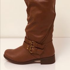 Morgan Brown Asymmetrical Zipper Boots:These Boots Are One Of A Kind It Has A Asymmetrical Zipper That Zips Up On The Side Along With Two Buckles Around The Ankle.It Comes In The Color Chestnut Brown This This Boot Is Vary Stylish And Comfortable. Trendy Spring Boots With Side Zipper, Trendy Leather Boots With Side Zipper, Fall Moto Boots With Wide Calf And Zipper, Fall Wide Calf Moto Boots With Zipper, Fall Moto Boots With Zipper Closure, Medium Width, Moto Boots With Zipper Closure, Medium Width For Fall, Moto Boots With Zipper Closure For Fall, Morgan Brown, Chestnut Brown