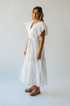 Get ready to turn heads in the Cresswell Eyelet Detail Dress! This stunning off-white dress features eyelet detailing and a figure-flattering silhouette, perfect for any occasion. With its playful design and unique features, this dress is sure to make a statement wherever you go. Be the talk of the town in the Cresswell Eyelet Detail Dress! Details self: 100% cotton lining: 100% rayon Fabric Care Guide Here Sizing & Fit Measurements are approximate and taken while laying flat across the front. N Chic Eyelet V-neck Dress, White Lace Trim Maxi Dress For Casual Wear, Elegant Midi Length Eyelet Dress, Fitted V-neck Eyelet Dress, White Cotton Maxi Dress With Broderie Anglaise, Elegant Midi Dress With Eyelet Details, Feminine Midi-length Eyelet Dress, Feminine Midi Length Eyelet Dress, White Dress With Cutwork Hem For Garden Party