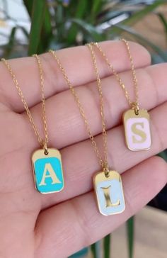 "The coolest initial necklaces just released!! These dog tag personalized necklaces come on a beautiful paper clip chain. They are 16\" (and come with a 2\" extension) -sterling silver -14K gold plated -stamped 925 **In the \"letter to seller\" section please include your email address and your initial Free shipping in the US! If you have questions please don't hesitate to ask. Happy shopping!!" Enamel Initial Pendant Necklace As Gift, Enamel Initial Pendant Jewelry Gift, Trendy Personalized Initial Necklace, Enamel Gold Jewelry With Initials, Personalized Dainty Enamel Jewelry, Personalized Enamel Charm Necklaces For Gifts, Personalized Enamel Jewelry For Everyday, Everyday Personalized Enamel Jewelry, Initial Pendant Necklace With Paperclip Chain For Gift