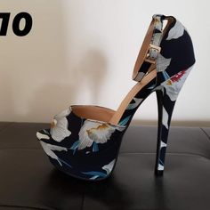 Dark Navy Blue Floral Platform Heels With A Peep-Toe, Adjustable Ankle Strap (With Gold Buckle), And 6" Heel. Toe Platform Rises 1.75" Tall. Cushioned Insole. Felted Rubber Sole Has Nonskid Markings. New Without Box Never Worn Blue Floral Print Open Toe Heels, Dark Navy Blue, Platform Heels, Dark Navy, Blue Floral, Blue Gold, Shoes Women Heels, Ankle Strap, Rubber Sole