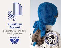 the back of a woman's head wearing a blue knitted hat and scarf