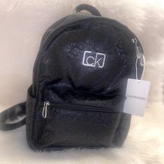 Condition: New With Tags! Color: Black Material: Polyester Fashionable/Cute/Practical Small Backpack; Fits Up To Two Small/Medium Drink Bottles As It Has Two Side Pockets Accepting Any “Reasonable Offers” Calvin Klein Bags Backpacks, Backpack Fits, Calvin Klein Bags, Calvin Klein Bag, Small Backpack, Calvin Klein Black, Womens Calvin Klein, Drink Bottles, Calvin Klein