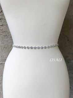 LISALI Skinny Wedding Dress Bridal Sash, Crystal Bridal Sash, Rhinestone Sash, Bridesmaid Belt, Wedding Dress Sash，Flower Belt This beatiful bridal sash is perfect for adding some bling to your dress! Made of - This beautiful sash is made with sparkly rhinestones details, very elegant. - The rhinestone portion is 16-34 inches long and about 0.4 inches wide. - satin ribbon - your color choice - the ribbon on the sash is a total of 100 inches long and it will fit sizes xs-xl. If you would like it Silver Fitted Bridal Belt For Bridesmaid, Fitted Silver Bridal Belt For Bridesmaid, Silver Sparkly Dress, Belt Wedding Dress, Sparkly Belts, Bridesmaid Belt, Saree With Belt, Bling Belts, Bling Wedding Dress