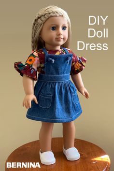 a doll is standing on top of a table