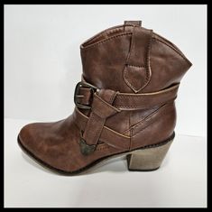 The Satire Dark Brown Western Boot Serves Up Some Cowgirl Sass With Its Scrunched Shaft, Wrapped Belt And Worn Toe. Sz 7 Nwt **Bundle & Save!!!** Add Items From My Closet To Get An Extra Discount On Everything & Pay Only 1 Shipping Fee. Best Way To Posh For Great Deals!!! *Bundle Your Likes & Send An Offer *Smoke Free/Animal Friendly Home *Ships Same/Next Day *Always...Beyou'nique! Adjustable Brown Boots With Round Toe, Brown Adjustable Round Toe Boots, Adjustable Round Toe Fall Boots, Adjustable Round Toe Boots For Fall, Brown Western Boots, Burgundy Boots Ankle, Cognac Boots, Womens Cowgirl Boots, Metallic Boots